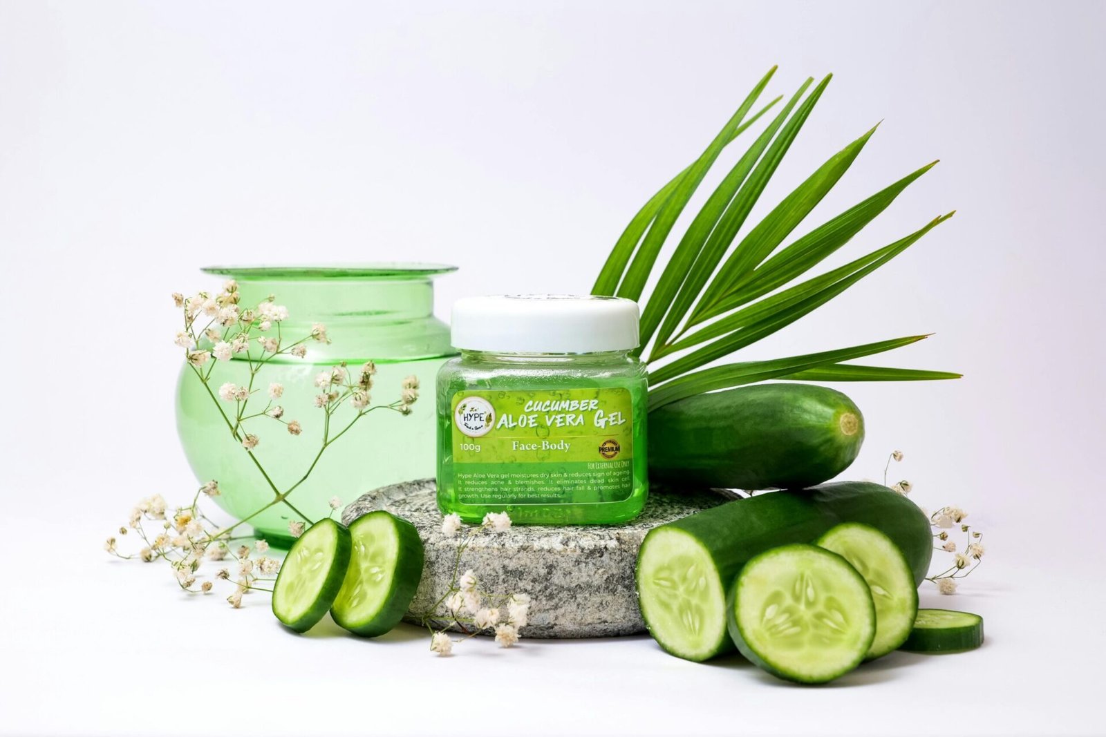 Natural skincare ingredients including fresh aloe vera honey and cucumber slices for a hydrating summer skin glow