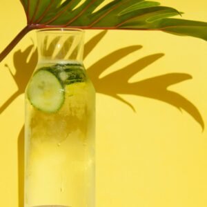 Best morning drinks for weight loss with cucumber detox water in glass bottle