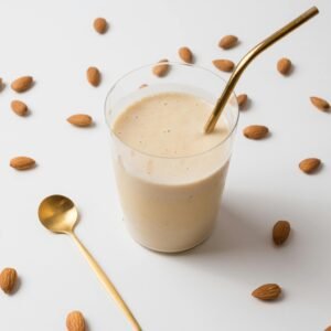 Best morning drinks for weight loss with healthy protein shake and almonds